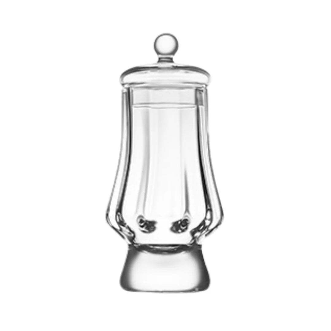 Model G510 is a tulip-shaped, hand-crafted glass, slightly modified by our experts. Recommended for heavier peat-smoke whiskies. Additionally it is finish by special „optic touch” version which brings the exclusivity even higher. Its delicate shape comes from a meticulous glass blowing process. Supplied with a hand- crafted matching “inside” cover which prevents evaporation and preserves the aroma.&nbsp;